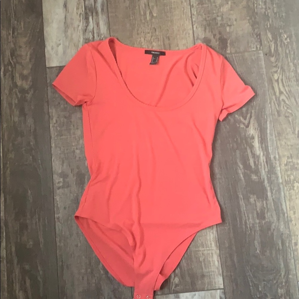 pink body suit